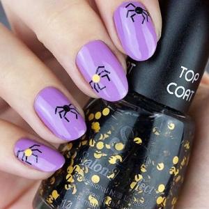 紫色蜘蛛美甲图片